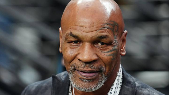 Sep 24, 2023; Paradise, Nevada, USA; Mike Tyson poses for a photo on the sidelines before the start of a game between the Las Vegas Raiders and the Pittsburgh Steelers at Allegiant Stadium. 