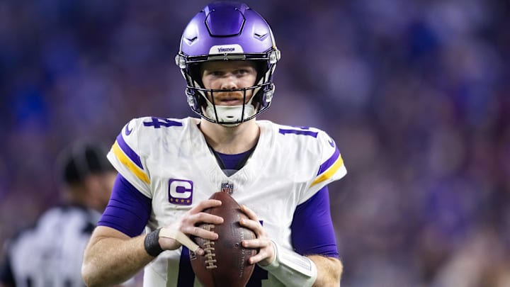 Jan 13, 2025; Glendale, AZ, USA; Minnesota Vikings quarterback Sam Darnold (14) against the Los Angeles Rams during an NFC wild card game at State Farm Stadium.