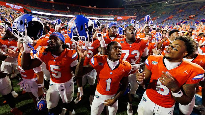 Sep 12, 2026; Gainesville, Florida, USA; Florida Gators inside linebacker Myles Graham (5), Florida Gators wide receiver Vernell Brown III (1) and Florida Gators wide receiver Dallas Wilson (6) sing the alma mater after a game against the Campbell Fighting Camels at Ben Hill Griffin Stadium. Mandatory Credit: Matt Pendleton-Imagn Images Sep 12, 2026; Gainesville, Florida, USA; Florida Gators inside linebacker Myles Graham (5), Florida Gators wide receiver Vernell Brown III (1) and Florida Gators wide receiver Dallas Wilson (6) sing the alma mater after a game against the Campbell Fighting Camels at Ben Hill Griffin Stadium. Mandatory Credit: Matt Pendleton-Imagn Images