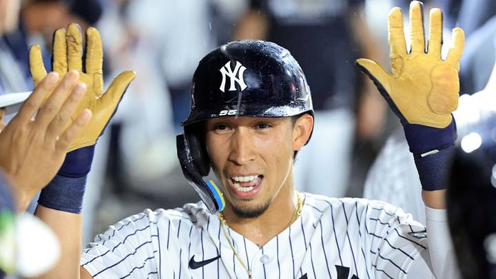 Tampa, Florida, USA; New York Yankees infielder Oswaldo Cabrera (95)  is congratulated after scoring a run during the second inning against the Tampa Bay Rays at George M. Steinbrenner Field. Mandatory Credit: Kim Klement Neitzel-Imagn Images