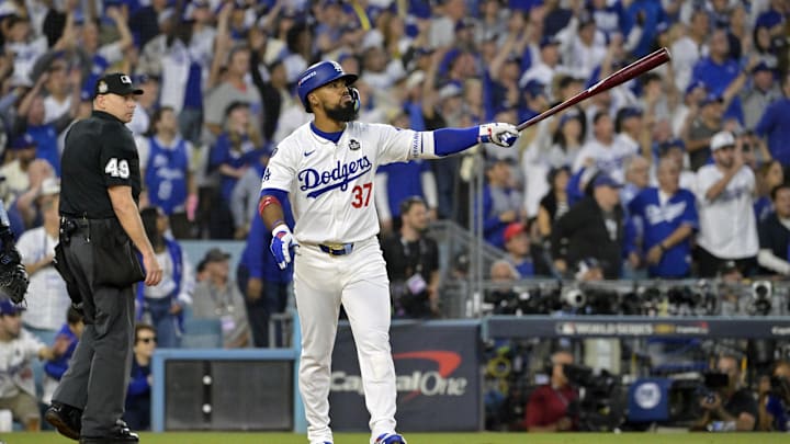 Oct 26, 2024; Los Angeles, California, USA; Los Angeles Dodgers outfielder Teoscar Hernandez (37) hits a two run home run in the third inning against the New York Yankees during game two of the 2024 MLB World Series at Dodger Stadium. Mandatory Credit: Jayne Kamin-Oncea-Imagn Images