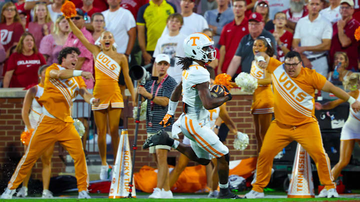 Sep 21, 2024; Norman, Oklahoma, USA;  Tennessee Volunteers wide receiver Dont'e Thornton Jr. (1) runs for a touchdown during the first quarter against the Oklahoma Sooners at Gaylord Family-Oklahoma Memorial Stadium. Mandatory Credit: Kevin Jairaj-Imagn Images