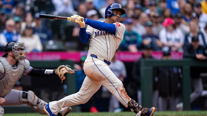 Seattle Mariners designated hitter Jorge Polanco hits a double against the Miami Marlins on April 27 at T-Mobile Park.