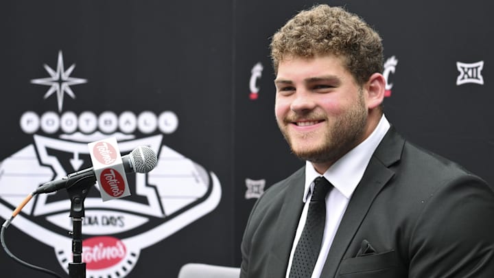 Jul 9, 2024; Las Vegas, NV, USA; Cincinnati offensive linemen Luke Kandra speaks to the media during the Big 12 Media Days at Allegiant Stadium. Mandatory Credit: Candice Ward-Imagn Images