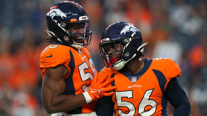 Aug 13, 2022; Denver, Colorado, USA; Denver Broncos linebacker Baron Browning (56) and linebacker Jonas Griffith (50) celebrate a play in the first quarter against the Dallas Cowboys at Empower Field at Mile High. Mandatory Credit: Ron Chenoy-Imagn Images Aug 13, 2022; Denver, Colorado, USA; Denver Broncos linebacker Baron Browning (56) and linebacker Jonas Griffith (50) celebrate a play in the first quarter against the Dallas Cowboys at Empower Field at Mile High. Mandatory Credit: Ron Chenoy-Imagn Images