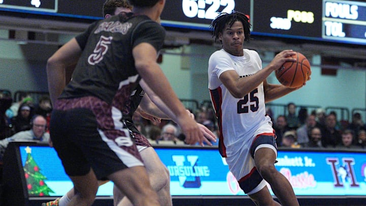 Stepinac's Jasiah Jervis (25) drives to the paint during the William F. Plunkett Jr. Christmas Classic against Scarsdale at Westchester County Center in White Plains on Saturday, December 21, 2024.