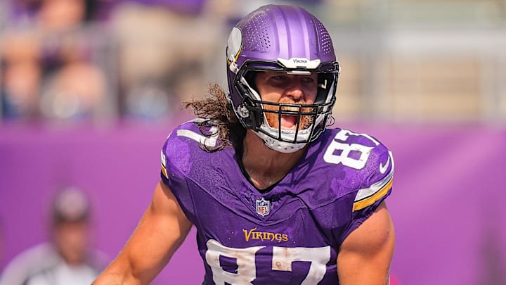 Sep 21, 2025; Minneapolis, Minnesota, USA; Minnesota Vikings tight end TJ. Hockenson (87) catches a touchdown pass against the Cincinnati Bengals during the second half at U.S. Bank Stadium. 