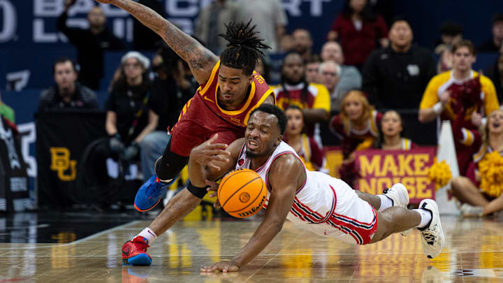 Houston guard LJ Cryer (right)
