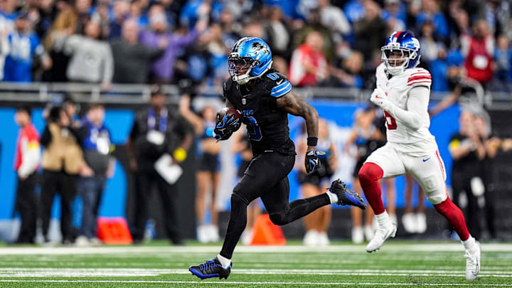 Detroit Lions running back Jahmyr Gibbs (0) runs against New York Giants during overtime at Ford Field in Detroit on Sunday, Nov. 23, 2025.