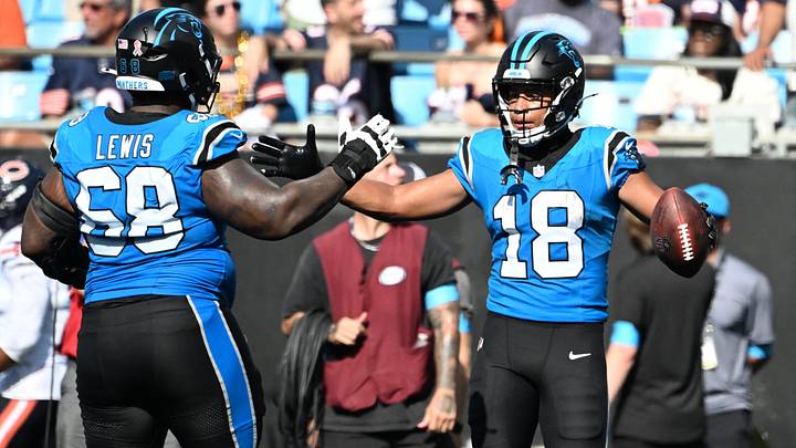 Carolina Panthers wide receiver Jalen Coker (18) clebrates with guard Damien Lewis (68) after scoring a touchdown in the second half at Bank of America Stadium. Mandatory Credit: Bob Donnan-Imagn Images Carolina Panthers wide receiver Jalen Coker (18) clebrates with guard Damien Lewis (68) after scoring a touchdown in the second half at Bank of America Stadium. Mandatory Credit: Bob Donnan-Imagn Images