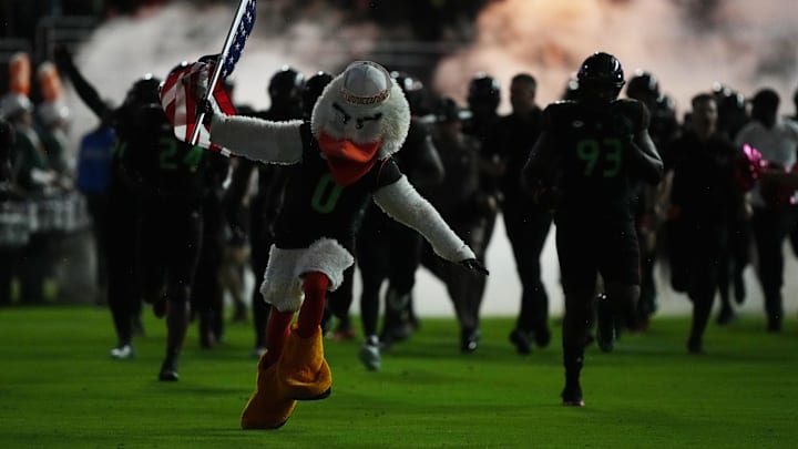 Oct 7, 2023; Miami Gardens, Florida, USA; Miami Hurricanes mascot Sebastian the Ibis leads the team onto the field.