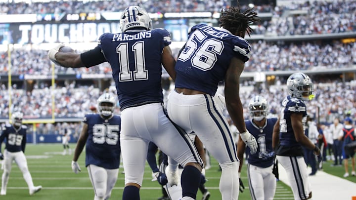 Oct 30, 2022; Arlington, Texas, USA; Dallas Cowboys linebacker Micah Parsons (11) and defensive end Dante Fowler Jr. (56) celebrate a touchdown in the third quarter against the Chicago Bears at AT&T Stadium. Oct 30, 2022; Arlington, Texas, USA; Dallas Cowboys linebacker Micah Parsons (11) and defensive end Dante Fowler Jr. (56) celebrate a touchdown in the third quarter against the Chicago Bears at AT&T Stadium.