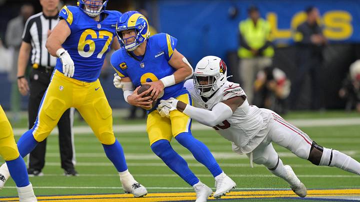 Jan 4, 2026; Inglewood, California, USA; Los Angeles Rams quarterback Matthew Stafford (9) is sacked Arizona Cardinals linebacker Josh Sweat (10) during the first half at SoFi Stadium. Mandatory Credit: Jayne Kamin-Oncea-Imagn Images Jan 4, 2026; Inglewood, California, USA; Los Angeles Rams quarterback Matthew Stafford (9) is sacked Arizona Cardinals linebacker Josh Sweat (10) during the first half at SoFi Stadium. Mandatory Credit: Jayne Kamin-Oncea-Imagn Images