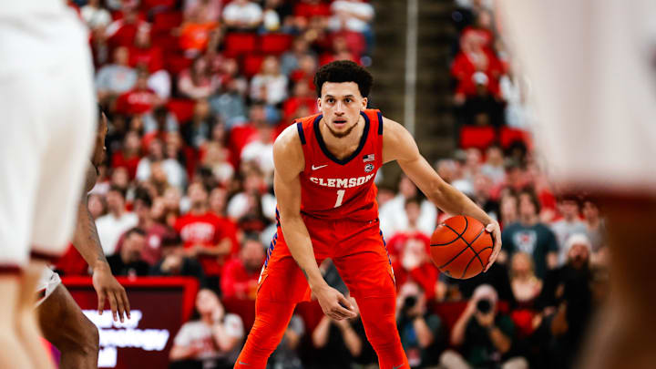 Feb 1, 2025; Raleigh, North Carolina, USA; Clemson Tigers guard Chase Hunter (1) holds the ball during the second half of the game against the North Carolina State Wolfpack at Lenovo Center. Feb 1, 2025; Raleigh, North Carolina, USA; Clemson Tigers guard Chase Hunter (1) holds the ball during the second half of the game against the North Carolina State Wolfpack at Lenovo Center.