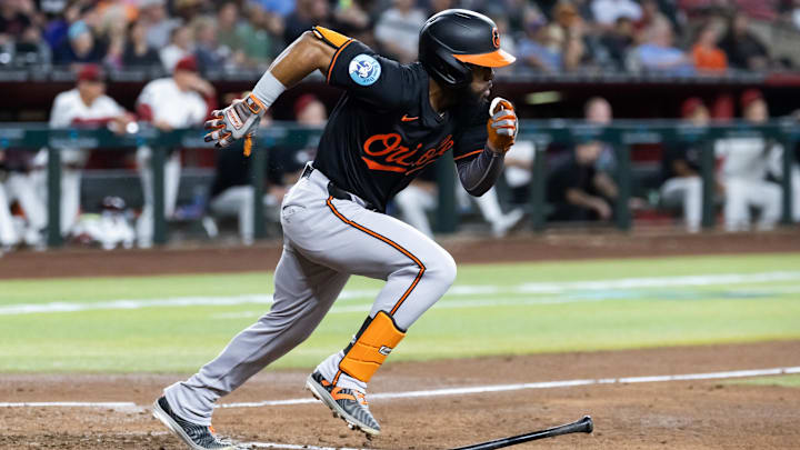 Apr 7, 2025; Phoenix, Arizona, USA; Baltimore Orioles outfielder Cedric Mullins drives in a run in the fourth inning against the Arizona Diamondbacks at Chase Field. Apr 7, 2025; Phoenix, Arizona, USA; Baltimore Orioles outfielder Cedric Mullins drives in a run in the fourth inning against the Arizona Diamondbacks at Chase Field.