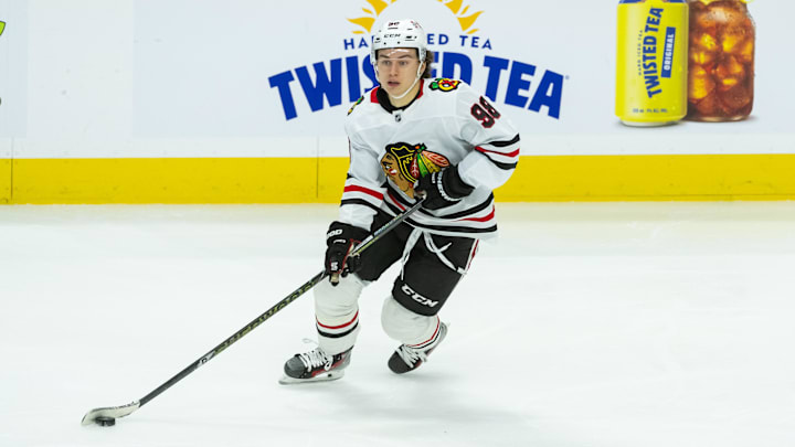 Apr 15, 2025; Ottawa, Ontario, CAN; Chicago Blackhawks center Connor Bedard (98) skates with the puck in the third period against the Ottawa Senators at the Canadian Tire Centre. Mandatory Credit: Marc DesRosiers-Imagn Images