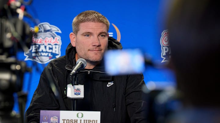 Oregon defensive coordinator Tosh Lupoi speaks during a media day as the Oregon Ducks arrive on Jan. 7, 2025, in Atlanta, Georgia ahead of the Peach Bowl at Mercedes-Benz Stadium.