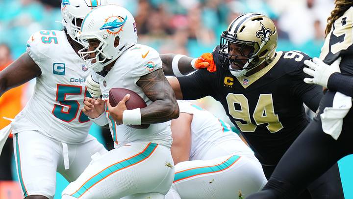 QB Tua Tagovailoa is pressured by New Orleans Saints defensive end Cameron Jordan. QB Tua Tagovailoa is pressured by New Orleans Saints defensive end Cameron Jordan.