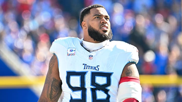Oct 20, 2024; Orchard Park, New York, USA; Tennessee Titans defensive tackle Jeffery Simmons (98) looks to the scoreboard in the second quarter game against the Buffalo Bills at Highmark Stadium. Mandatory Credit: Mark Konezny-Imagn Images Oct 20, 2024; Orchard Park, New York, USA; Tennessee Titans defensive tackle Jeffery Simmons (98) looks to the scoreboard in the second quarter game against the Buffalo Bills at Highmark Stadium. Mandatory Credit: Mark Konezny-Imagn Images