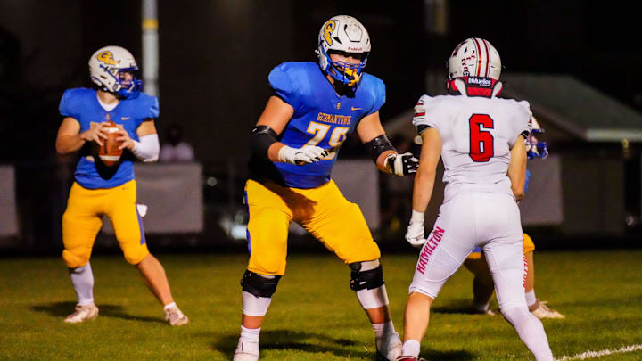 Germantown lineman Cole Reiter (79) protects his quarterback during the game against Sussex Hamilton, Sept. 19, 2025, in Germantown, Wisconsin. Hamilton won the game, 23-21. Germantown lineman Cole Reiter (79) protects his quarterback during the game against Sussex Hamilton, Sept. 19, 2025, in Germantown, Wisconsin. Hamilton won the game, 23-21.