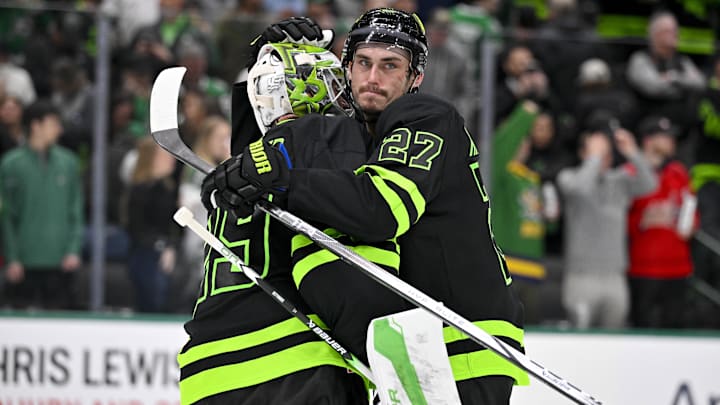 Dec 16, 2024; Dallas, Texas, USA; Dallas Stars goaltender Jake Oettinger (29) and left wing Mason Marchment (27) celebrate on the ice after the Stars defeat the Washington Capitals at the American Airlines Center. Mandatory Credit: Jerome Miron-Imagn Images