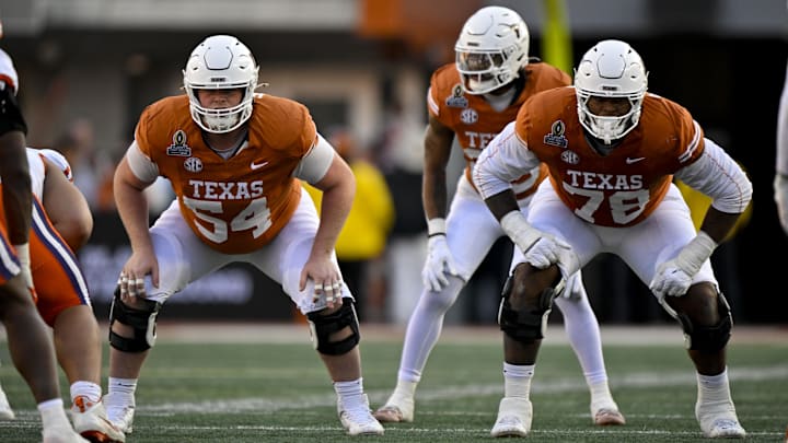 Dec 21, 2024; Austin, Texas, USA; Texas Longhorns offensive lineman Cole Hutson (54) and offensive lineman Kelvin Banks Jr. (78) in action during the game between the Texas Longhorns and the Clemson Tigers in the CFP National Playoff First Round at Darrell K Royal-Texas Memorial Stadium. Mandatory Credit: Jerome Miron-Imagn Images
