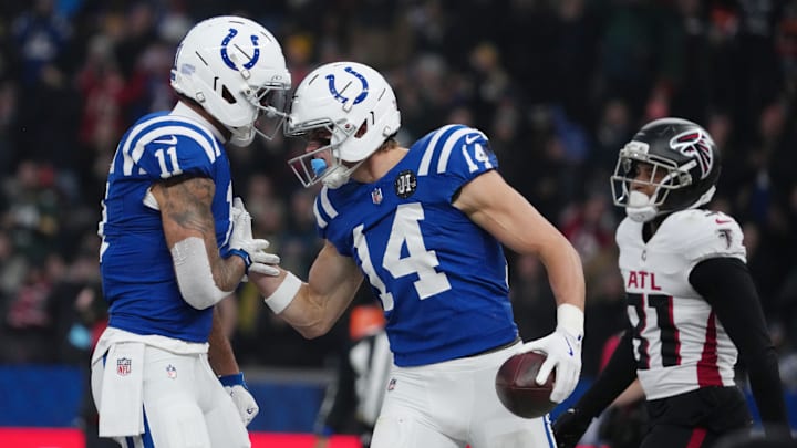 Nov 9, 2025; Berlin, Germany; Indianapolis Colts wide receiver Alec Pierce (14) and Indianapolis Colts wide receiver Michael Pittman Jr. (11) react against the Atlanta Falcons during the NFL Berlin Game at Olympic Stadium. 