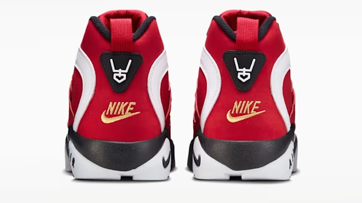 The Nike Air Diamond Turf 2 in the "Prime Red" colorway.