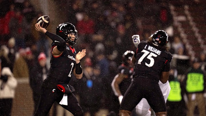 Nov 30, 2024; Cincinnati, Ohio, USA; Cincinnati Bearcats quarterback Brendan Sorsby (2) throws a pass against the TCU Horned Frogs in the third quarter at Nippert Stadium. Mandatory Credit: Albert Cesare/USA TODAY Network via Imagn Images Nov 30, 2024; Cincinnati, Ohio, USA; Cincinnati Bearcats quarterback Brendan Sorsby (2) throws a pass against the TCU Horned Frogs in the third quarter at Nippert Stadium. Mandatory Credit: Albert Cesare/USA TODAY Network via Imagn Images