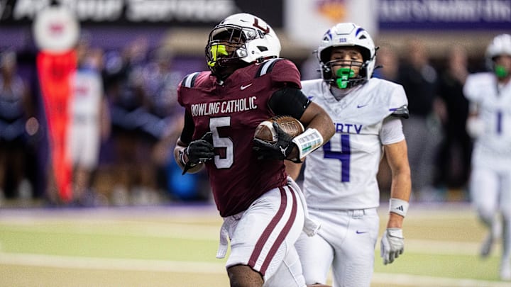 Dowling Catholic’s Ian Middleton (5) runs into the end zone for a touchdown on Nov. 21, 2025, at the UNI-Dome in Cedar Falls.