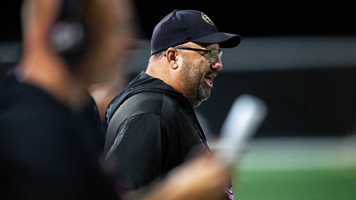Des Moines Lincoln (IA) head coach Tom Alessio Jr. calls to his players during the third quarter against Centennial on Sept. 11, 2025, at Mediacom Stadium. Alessio resigned from his head coaching role on July 20 after he was fired from his position in the Polk County government amid a misconduct investigation.