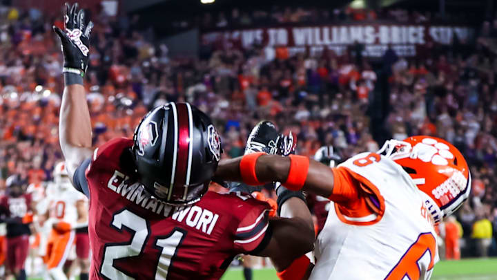 Nov 25, 2023; Columbia, South Carolina, USA; South Carolina Gamecocks defensive back Nick Emmanwori (21) intercepts a pass intended for Clemson Tigers wide receiver Tyler Brown (6) in the second half at Williams-Brice Stadium. Mandatory Credit: Jeff Blake-Imagn Images