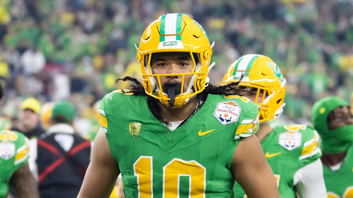 Jan 1, 2024; Glendale, AZ, USA; Oregon Ducks defensive end Matayo Uiagalelei (10) against the Liberty Flames during the 2024 Fiesta Bowl at State Farm Stadium. Mandatory Credit: Mark J. Rebilas-Imagn Images