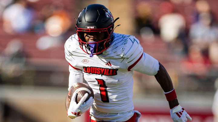 Nov 16, 2024; Stanford, California, USA; Louisville Cardinals wide receiver Ja'Corey Brooks (1) runs with the ball during the second quarter against the Stanford Cardinal at Stanford Stadium.