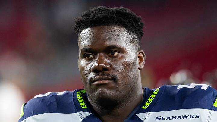 Seattle Seahawks center Olu Oluwatimi (55) looks on