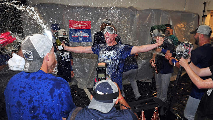 Sep 10, 2019; Baltimore, MD, USA; Los Angeles Dodgers hitting coach Brant Brown (middle) celebrates after clinching the NL West division after defeating the Baltimore Orioles at Oriole Park at Camden Yards. Mandatory Credit: Evan Habeeb-Imagn Images Sep 10, 2019; Baltimore, MD, USA; Los Angeles Dodgers hitting coach Brant Brown (middle) celebrates after clinching the NL West division after defeating the Baltimore Orioles at Oriole Park at Camden Yards. Mandatory Credit: Evan Habeeb-Imagn Images