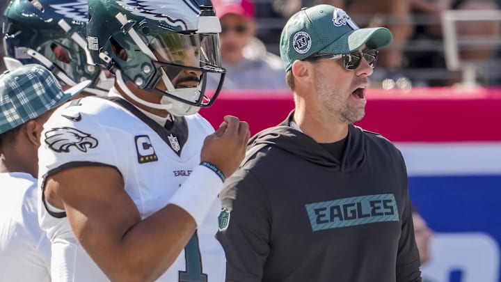 Philadelphia Eagles quarterback Jalen Hurts (1) and head coach Nick Sirianni pregame against the New York Giants at MetLife Stadium.