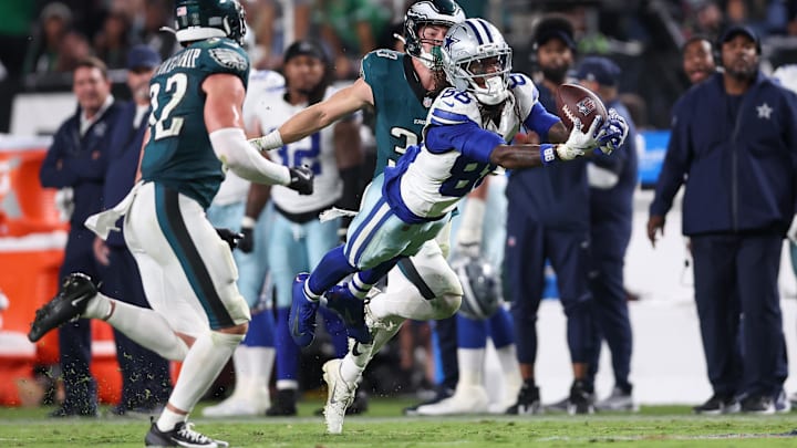 Dallas Cowboys WR CeeDee Lamb is unable to make a reception defended by Eagles S Reed Blankenship and CB Cooper DeJean. Dallas Cowboys WR CeeDee Lamb is unable to make a reception defended by Eagles S Reed Blankenship and CB Cooper DeJean.