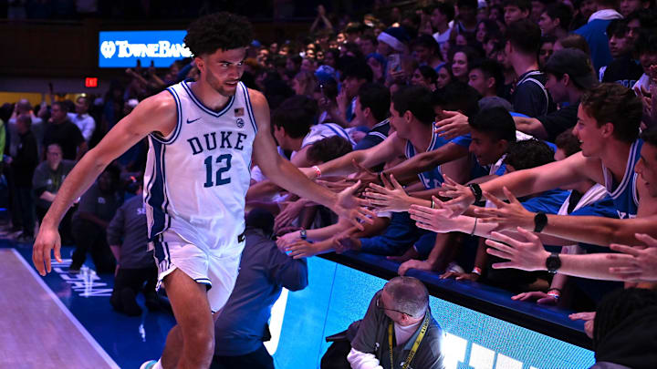 Jan 10, 2026; Durham, North Carolina, USA; Duke Blue Devils forward Cameron Boozer (12) greets fans after a game against the Southern Methodist Mustangs at Cameron Indoor Stadium.