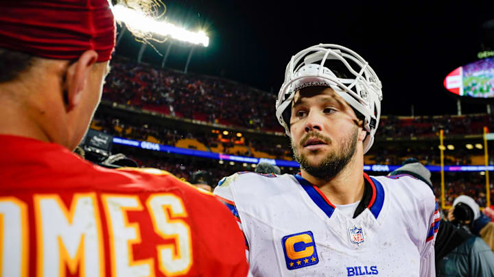 Buffalo Bills quarterback Josh Allen (17) talks with Kansas City Chiefs quarterback Patrick Mahomes (15) after a game  at GEHA Field at Arrowhead Stadium.