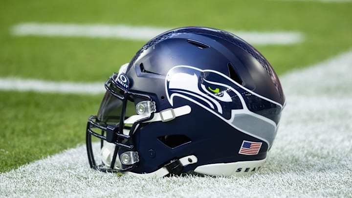 Dec 8, 2024; Glendale, Arizona, USA; Detailed view of a Seattle Seahawks helmet at State Farm Stadium. Mandatory Credit: Mark J. Rebilas-Imagn Images Dec 8, 2024; Glendale, Arizona, USA; Detailed view of a Seattle Seahawks helmet at State Farm Stadium. Mandatory Credit: Mark J. Rebilas-Imagn Images