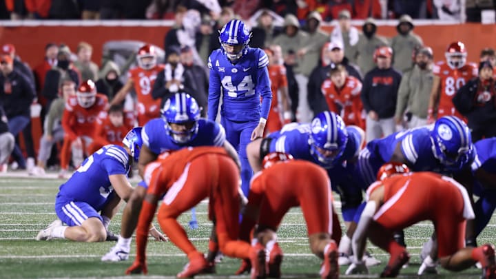 Nov 9, 2024; Salt Lake City, Utah, USA; Brigham Young Cougars place kicker Will Ferrin (44) kicks a field goal to take the lead over the Utah Utes during the last seconds of the game at Rice-Eccles Stadium. Mandatory Credit: Rob Gray-Imagn Images