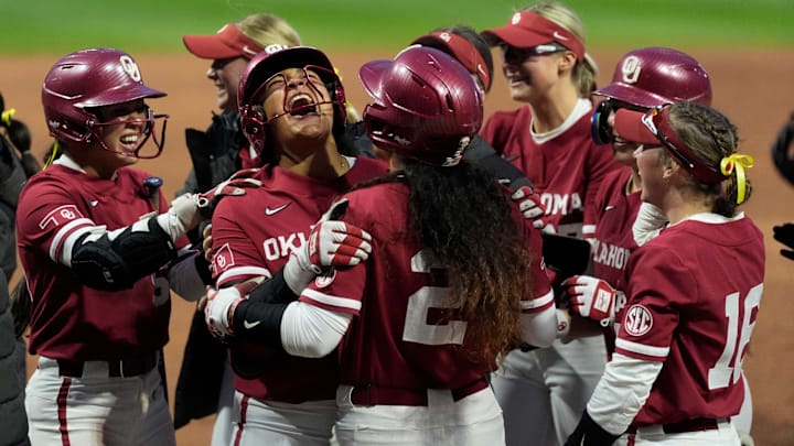 Oklahoma's Ella Parker celebrates a grand slam. Oklahoma's Ella Parker celebrates a grand slam.