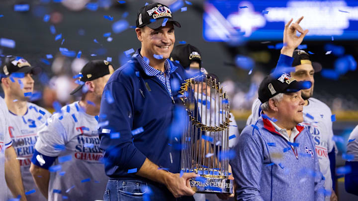 Nov 1, 2023; Phoenix, Arizona, USA; Texas Rangers general manager Chris Young celebrates with the trophy after winning the 2023 World Series in five game against the Arizona Diamondbacks at Chase Field.