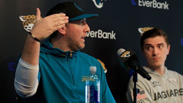 Jacksonville Jaguars head coach Liam Coen, left, speaks during a press conference next to general manager James Gladstone at Miller Electric Center Tuesday, April 15, 2025 in Jacksonville, Fla. [Corey Perrine/Florida Times-Union]