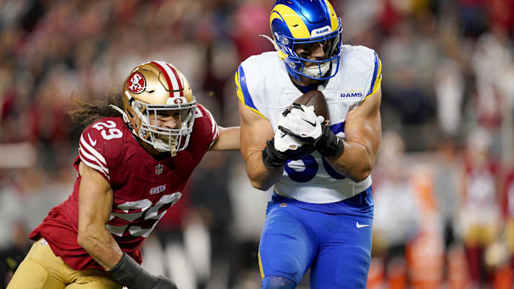 Dec 12, 2024; Santa Clara, California, USA; Los Angeles Rams tight end Colby Parkinson (86) makes a catch for a first down in front of San Francisco 49ers safety Talanoa Hufanga (29) in the fourth quarter at Levi's Stadium. Mandatory Credit: Cary Edmondson-Imagn Images Dec 12, 2024; Santa Clara, California, USA; Los Angeles Rams tight end Colby Parkinson (86) makes a catch for a first down in front of San Francisco 49ers safety Talanoa Hufanga (29) in the fourth quarter at Levi's Stadium. Mandatory Credit: Cary Edmondson-Imagn Images