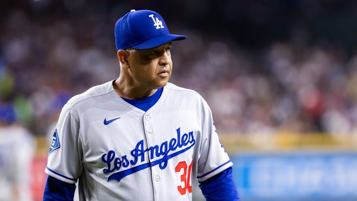 May 9, 2025; Phoenix, Arizona, USA; Los Angeles Dodgers manager Dave Roberts against the Arizona Diamondbacks at Chase Field. Mandatory Credit: Mark J. Rebilas-Imagn Images