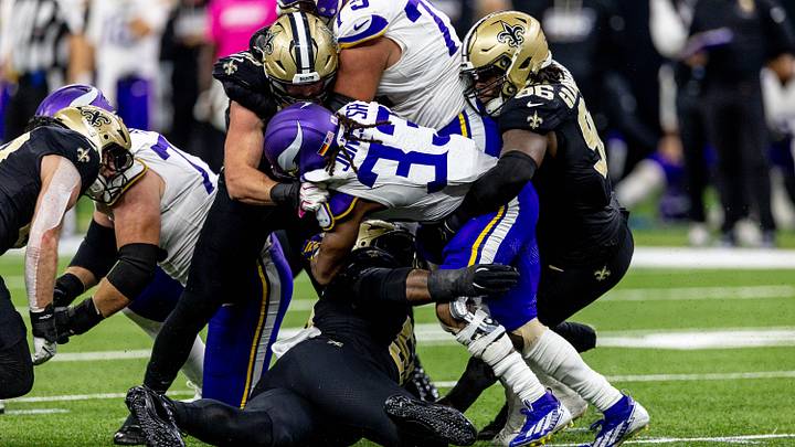 Oct 11, 2026; New Orleans, Louisiana, USA; Minnesota Vikings running back Aaron Jones (33) is tackled by New Orleans Saints defensive end Carl Granderson (96) during the first half at Caesars Superdome. Mandatory Credit: Stephen Lew-Imagn Images Oct 11, 2026; New Orleans, Louisiana, USA; Minnesota Vikings running back Aaron Jones (33) is tackled by New Orleans Saints defensive end Carl Granderson (96) during the first half at Caesars Superdome. Mandatory Credit: Stephen Lew-Imagn Images