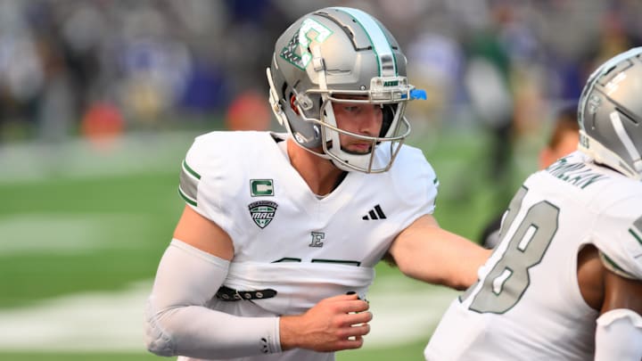 Sep 7, 2024; Seattle, Washington, USA; Eastern Michigan Eagles quarterback Cole Snyder (15) during warmups before the game against the Washington Huskies at Alaska Airlines Field at Husky Stadium. Mandatory Credit: Steven Bisig-Imagn Images