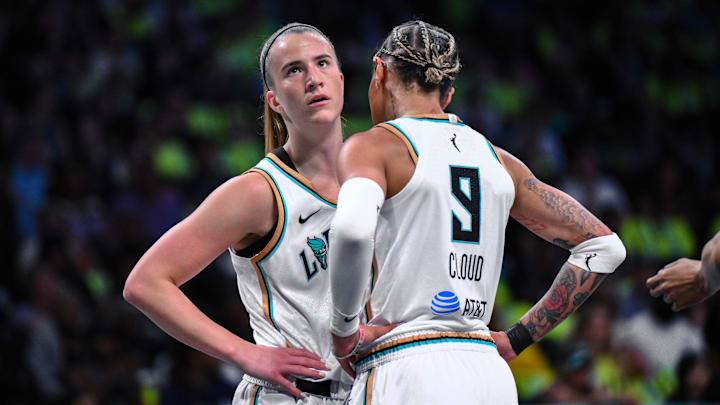 Jul 26, 2025; Brooklyn, New York, USA; New York Liberty guard Sabrina Ionescu (20) and guard Natasha Cloud (9) interact during the first half against the Los Angeles Sparks at Barclays Center. Mandatory Credit: John Jones-Imagn Images Jul 26, 2025; Brooklyn, New York, USA; New York Liberty guard Sabrina Ionescu (20) and guard Natasha Cloud (9) interact during the first half against the Los Angeles Sparks at Barclays Center. Mandatory Credit: John Jones-Imagn Images